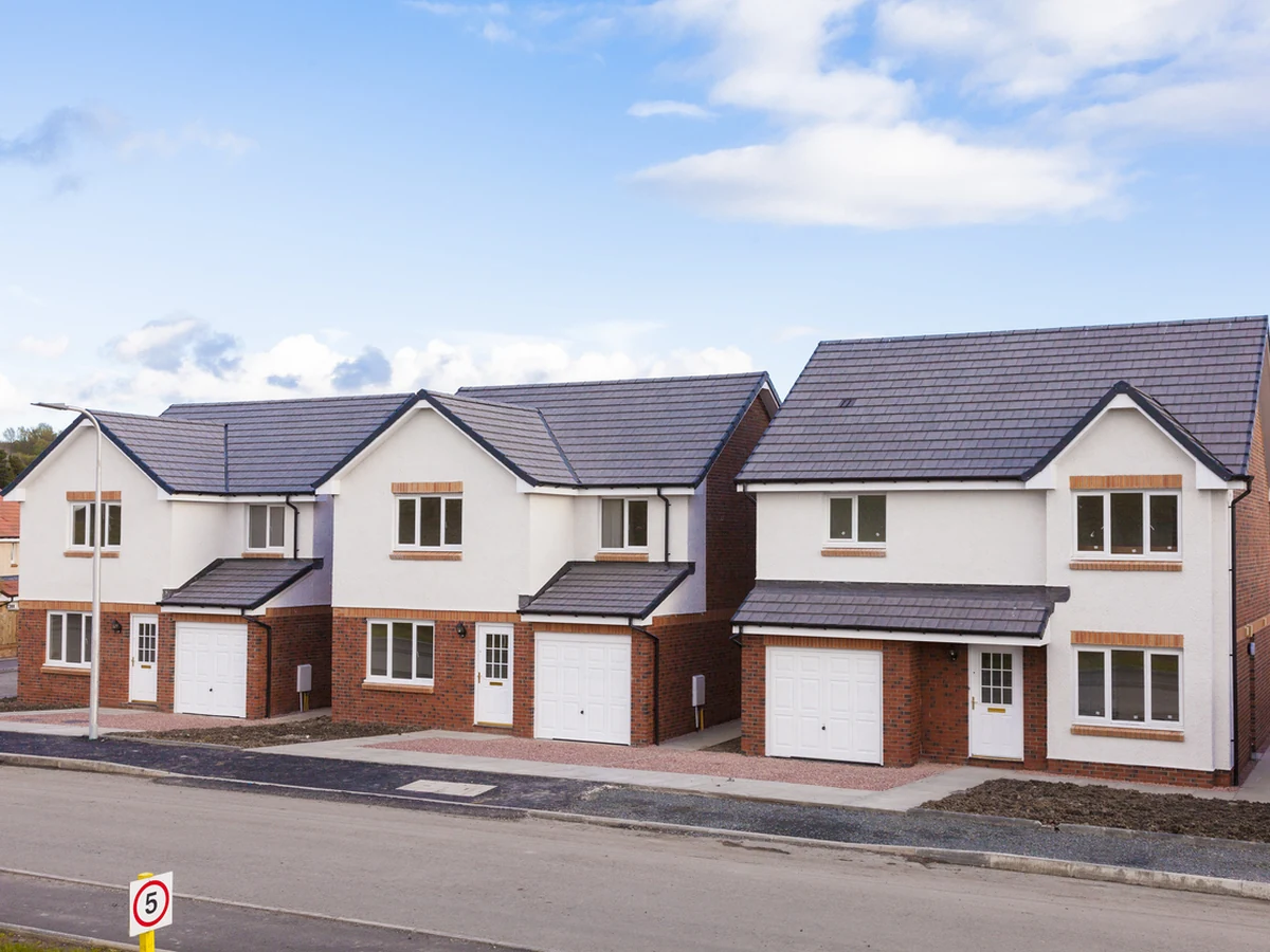 Exterior painting on a row of new detached houses in Plymouth, Plymouth Painters